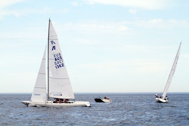 The little fishing boat saw the writing on the wall and evacuated the area. - Entire 2013 Etchells Victorian Championship ©  Alex McKinnon Photography http://www.alexmckinnonphotography.com